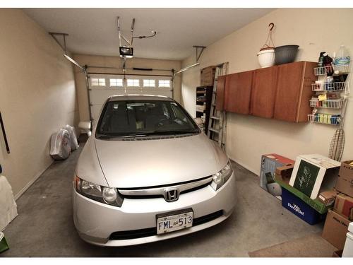 3-625 Barrera Road, Kelowna, BC - Indoor Photo Showing Garage