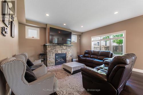 1762 Waterwheel Lane, London, ON - Indoor Photo Showing Living Room With Fireplace