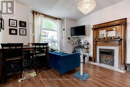 54 West Avenue N, Hamilton, ON - Indoor Photo Showing Other Room With Fireplace
