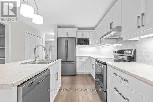 1 Ambrosia Path, St. Thomas, ON - Indoor Photo Showing Kitchen With Double Sink With Upgraded Kitchen