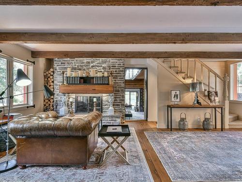 Living room - 55 Ch. De La Colline, Saint-Sauveur, QC - Indoor Photo Showing Living Room With Fireplace