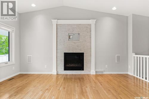3827 Cumberland Road E, Regina, SK - Indoor Photo Showing Other Room With Fireplace