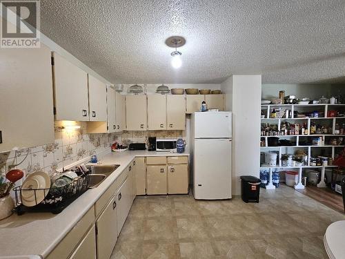 A 311 Bettcher Street, Quesnel, BC - Indoor Photo Showing Laundry Room