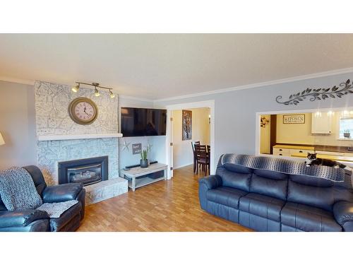 2617 2Nd Street S, Cranbrook, BC - Indoor Photo Showing Living Room With Fireplace