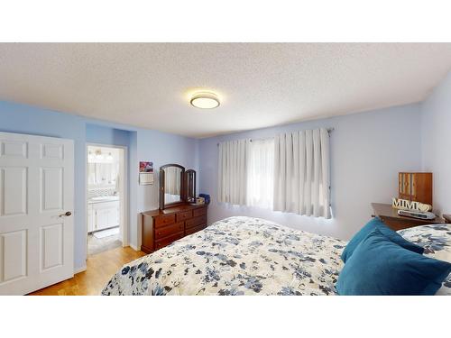 2617 2Nd Street S, Cranbrook, BC - Indoor Photo Showing Bedroom