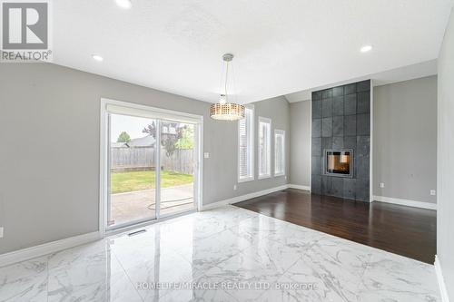 3239 Singleton Avenue, London, ON - Indoor With Fireplace