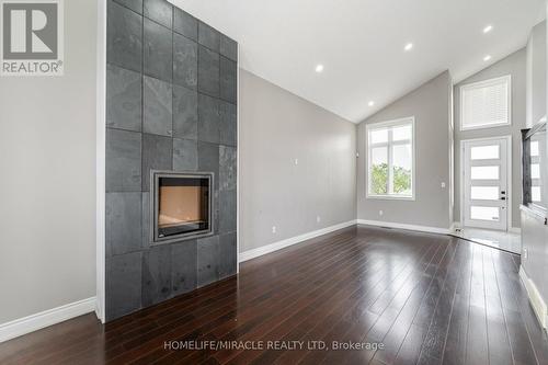 3239 Singleton Avenue, London, ON - Indoor Photo Showing Other Room With Fireplace