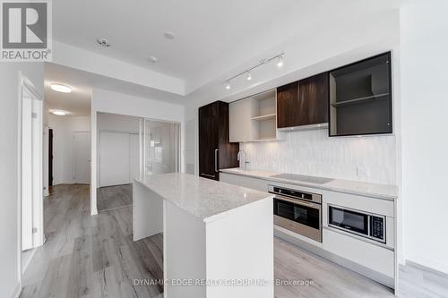 527 - 405 Dundas Street W, Oakville, ON - Indoor Photo Showing Kitchen With Upgraded Kitchen