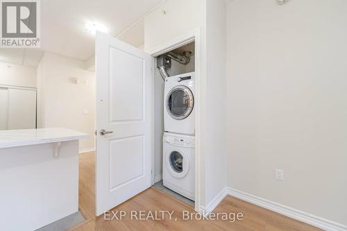 402 - 640 Sauve Street, Milton, ON - Indoor Photo Showing Laundry Room