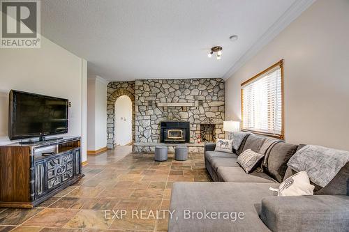 11677 Regional 25 Road N, Halton Hills, ON - Indoor Photo Showing Living Room With Fireplace