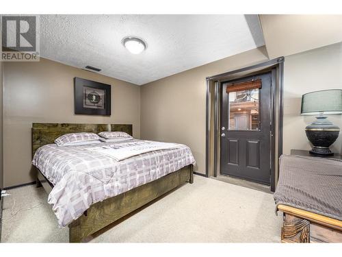 7959 Tronson Road, Vernon, BC - Indoor Photo Showing Bedroom