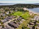 303-2589 Penrhyn St, Saanich, BC  - Outdoor With Body Of Water With View 