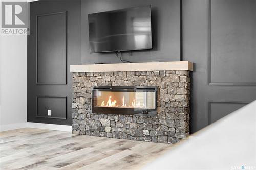 206 Germain Court, Saskatoon, SK - Indoor Photo Showing Living Room With Fireplace
