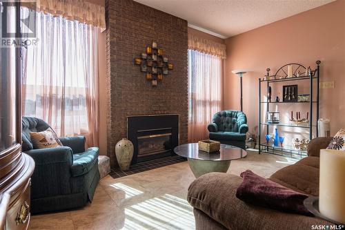 509 Grant Bay, Esterhazy, SK - Indoor Photo Showing Living Room With Fireplace