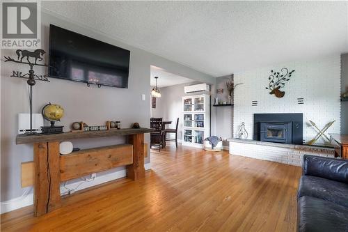 268 Wade Avenue, Renfrew, ON - Indoor Photo Showing Living Room With Fireplace