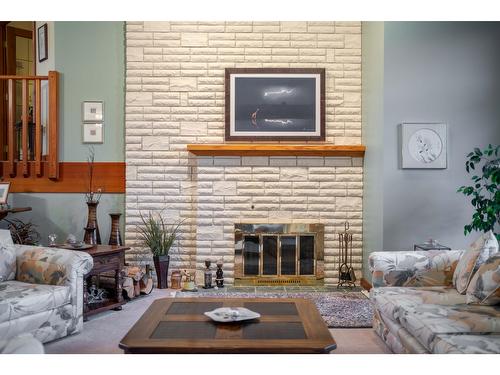 3023 Westside Road, Moyie, BC - Indoor Photo Showing Living Room With Fireplace