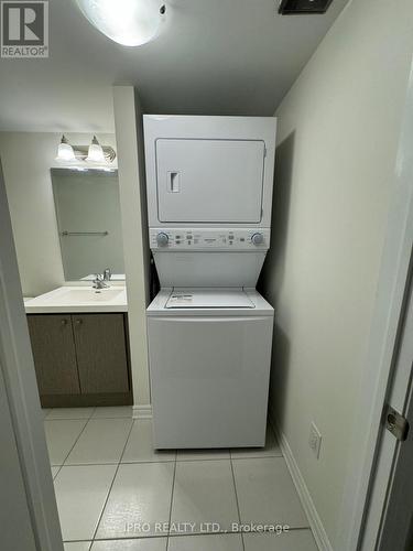 519 - 2791 Eglinton Avenue E, Toronto, ON - Indoor Photo Showing Laundry Room