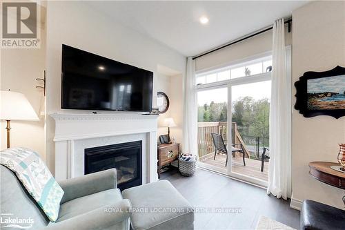 8 Little River Crossin, Wasaga Beach, ON - Indoor Photo Showing Living Room With Fireplace