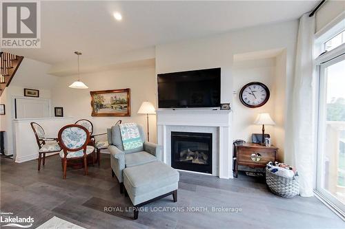 8 Little River Crossin, Wasaga Beach, ON - Indoor Photo Showing Living Room With Fireplace