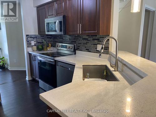 12 - 6400 Lawrence Avenue E, Toronto, ON - Indoor Photo Showing Kitchen With Upgraded Kitchen
