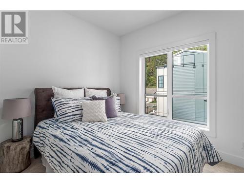 1455 Cara Glen Court Unit# 113, Kelowna, BC - Indoor Photo Showing Bedroom