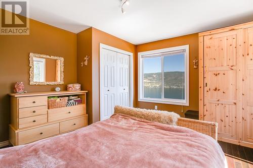 7110 Westside Road, Kelowna, BC - Indoor Photo Showing Bedroom