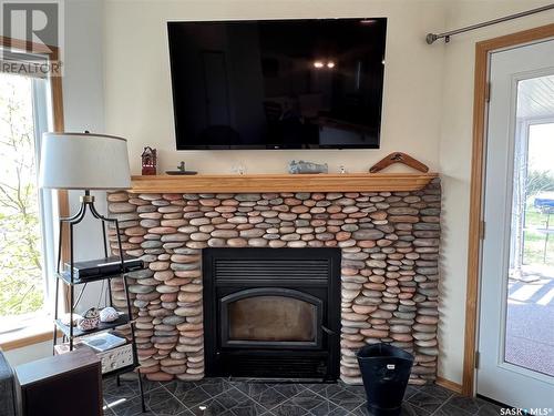 2017 Bay View Drive, Lac Des Iles, SK - Indoor Photo Showing Living Room With Fireplace