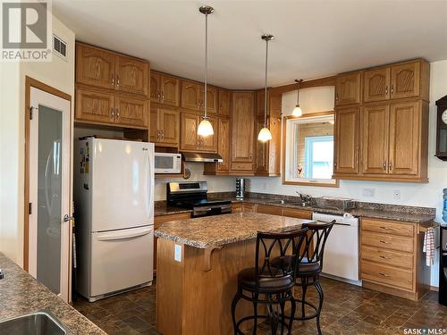 2017 Bay View Drive, Lac Des Iles, SK - Indoor Photo Showing Kitchen With Double Sink