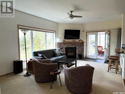 2017 Bay View Drive, Lac Des Iles, SK - Indoor Photo Showing Living Room With Fireplace