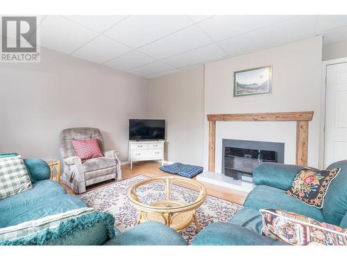 11300 Three Forks Road, Kelowna, BC - Indoor Photo Showing Living Room With Fireplace