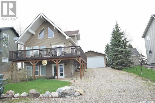 104 Sunridge Road, Pebble Baye, SK - Outdoor With Deck Patio Veranda