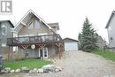 104 Sunridge Road, Pebble Baye, SK  - Outdoor With Deck Patio Veranda 