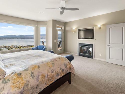 3569 Gala View Drive, West Kelowna, BC - Indoor Photo Showing Bedroom With Fireplace