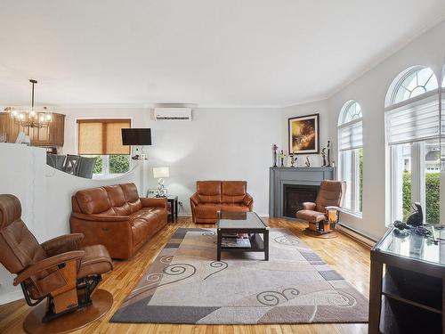 Salon - 71 Rue De La Pulperie, Saint-Jérôme, QC - Indoor Photo Showing Living Room With Fireplace