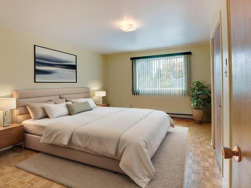 Chambre Ã  coucher principale - 206 Rue Filion, Laval (Sainte-Rose), QC - Indoor Photo Showing Bedroom