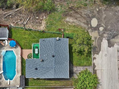 Aerial photo - 206 Rue Filion, Laval (Sainte-Rose), QC - Outdoor With In Ground Pool