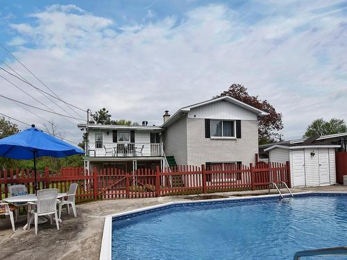 Exterior - 206 Rue Filion, Laval (Sainte-Rose), QC - Outdoor With Above Ground Pool