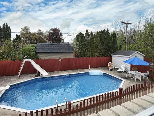 ExtÃ©rieur - 206 Rue Filion, Laval (Sainte-Rose), QC - Outdoor With In Ground Pool With Backyard