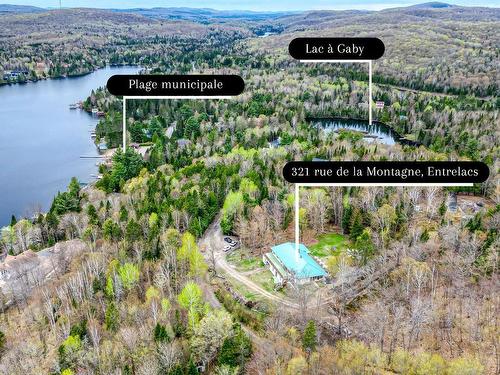 Photo aÃ©rienne - 321 Rue De La Montagne, Entrelacs, QC - Outdoor With Body Of Water With View
