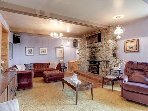 Salon - 321 Rue De La Montagne, Entrelacs, QC - Indoor Photo Showing Living Room With Fireplace