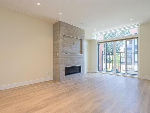 403-2130 Sooke Rd, Colwood, BC - Indoor With Fireplace