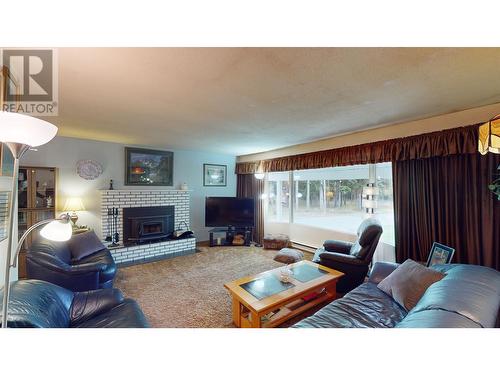 4059 Aird Road, Quesnel, BC - Indoor Photo Showing Living Room With Fireplace
