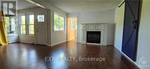 12 Herriott Street, Carleton Place, ON - Indoor Photo Showing Living Room With Fireplace