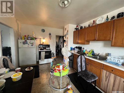 1627 22Nd Street W, Saskatoon, SK - Indoor Photo Showing Kitchen With Double Sink
