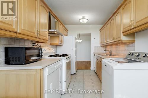 1004 - 175 Hilda Avenue, Toronto (Newtonbrook West), ON - Indoor Photo Showing Kitchen With Double Sink