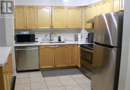 329 - 5225 Finch Avenue, Toronto (Agincourt North), ON - Indoor Photo Showing Kitchen With Stainless Steel Kitchen With Double Sink