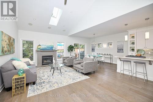 14 - 12 Cobblestone Drive, Niagara-On-The-Lake, ON - Indoor Photo Showing Living Room With Fireplace