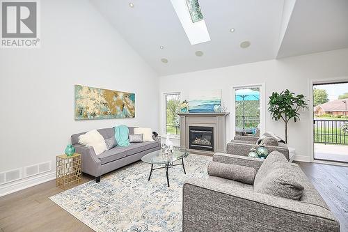 14 - 12 Cobblestone Drive, Niagara-On-The-Lake, ON - Indoor Photo Showing Living Room With Fireplace