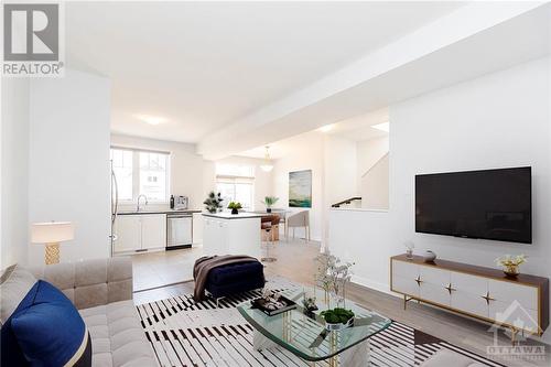 This photo is virtually staged. Open concept main floor with an abundance of natural light. - 68 Cordage Street, Ottawa, ON - Indoor Photo Showing Living Room