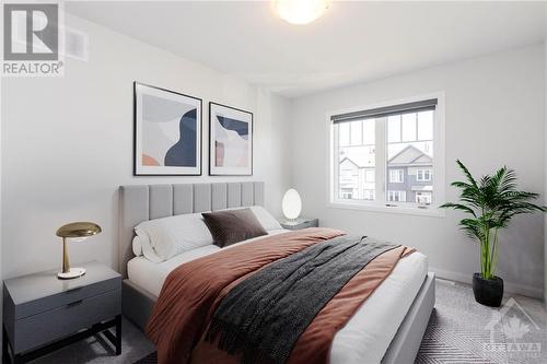 This photo is virtually staged. Primary bedroom that can fit a king size bed - 68 Cordage Street, Ottawa, ON - Indoor Photo Showing Bedroom